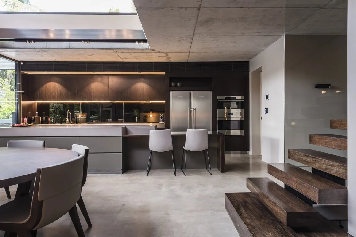 Honed polished concrete hallway with a water feature