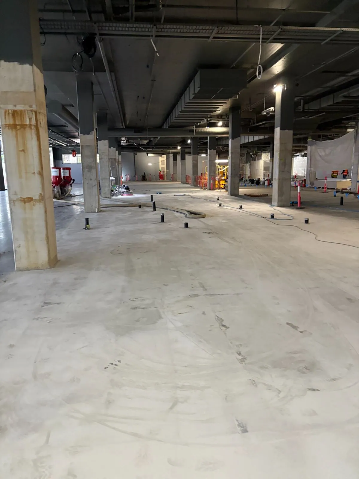 Concrete grinding and floor levelling in a Brisbane basement carpark