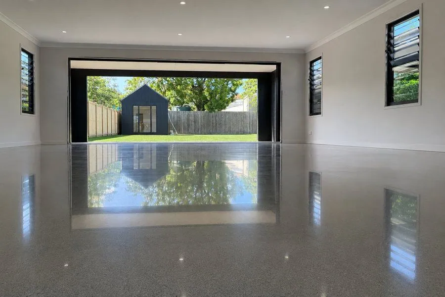 Mechanically polished concrete garage floor with exposed aggregate in Brisbane