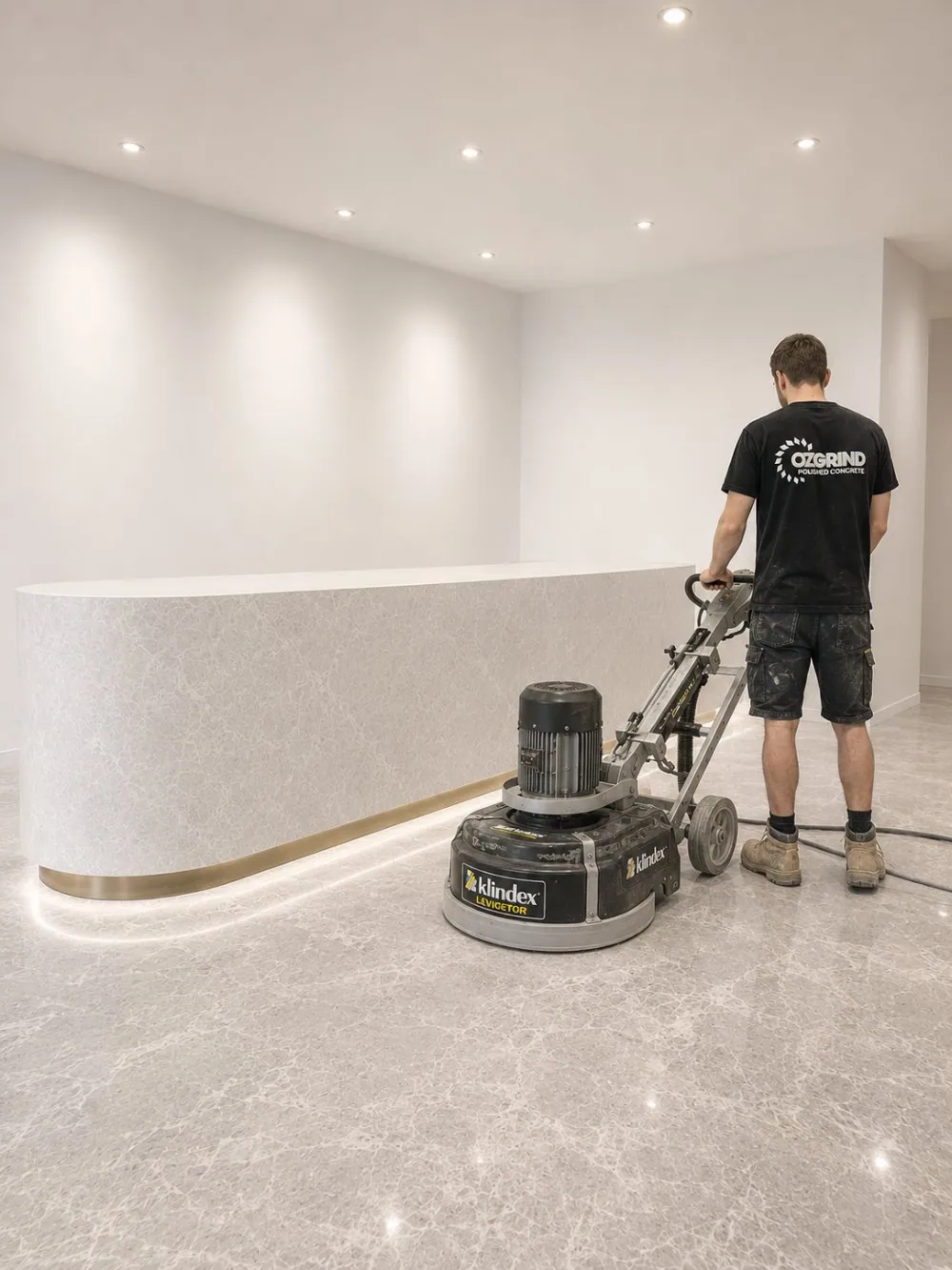 OzGrind team member polishing a marble floor in Brisbane