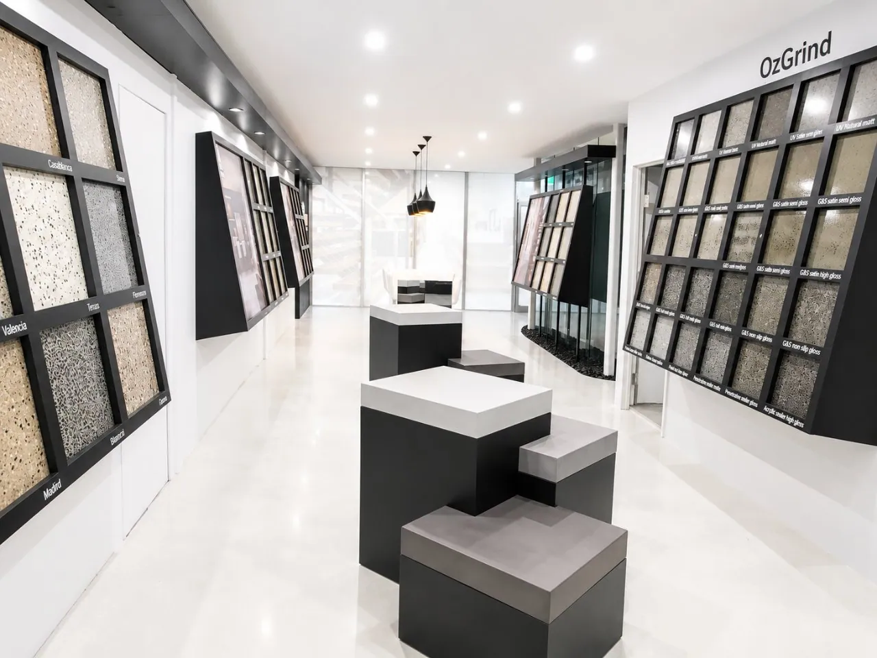 OzGrind showroom finish and gloss level sample wall, Brisbane