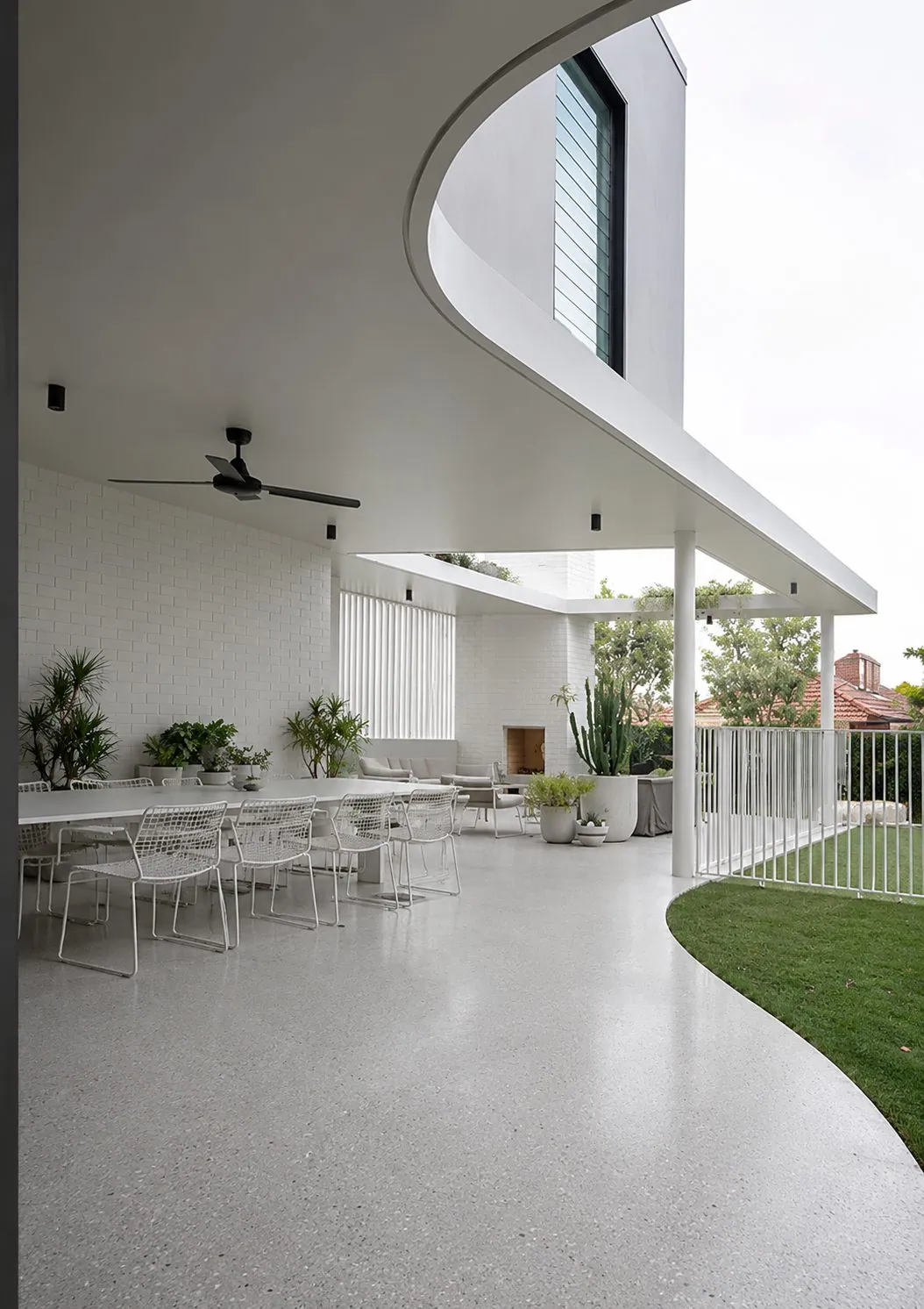 White Icelandia mix honed concrete alfresco and outdoor dining area in Brisbane