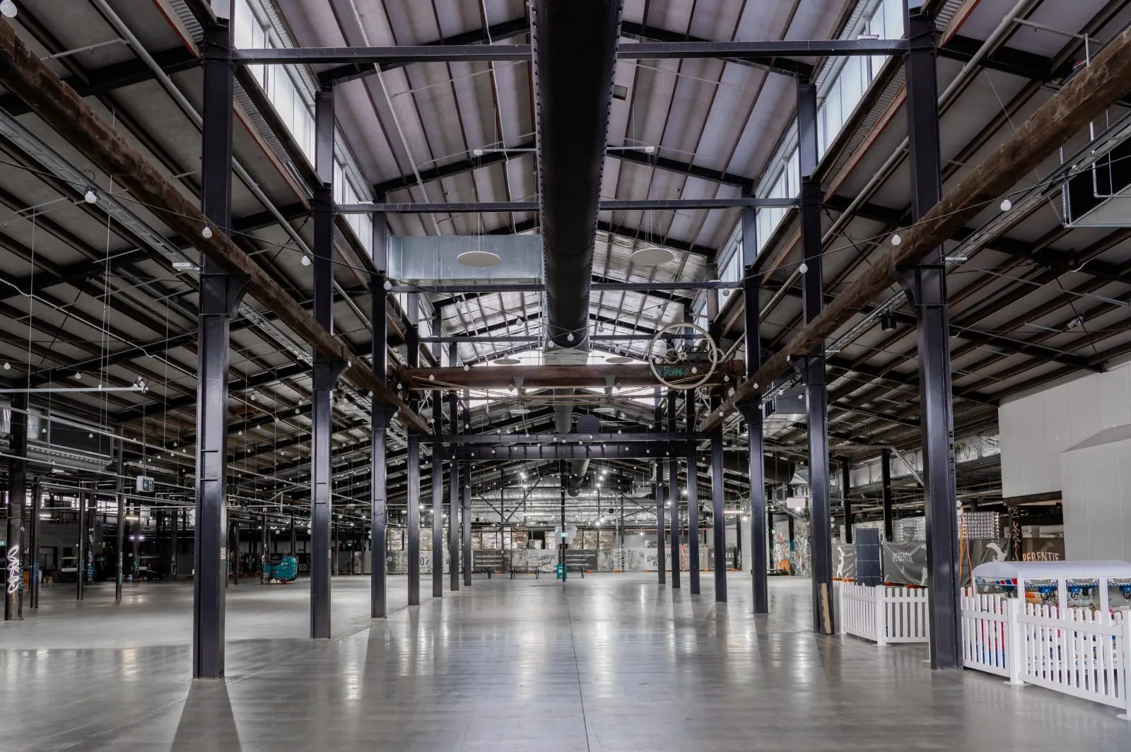 Large polished concrete industrial floor in the Distillery Road Market hall at Zarraffas Coffee, Brisbane