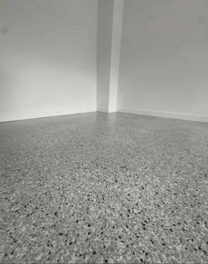 Clear coating the flake floor, Brisbane