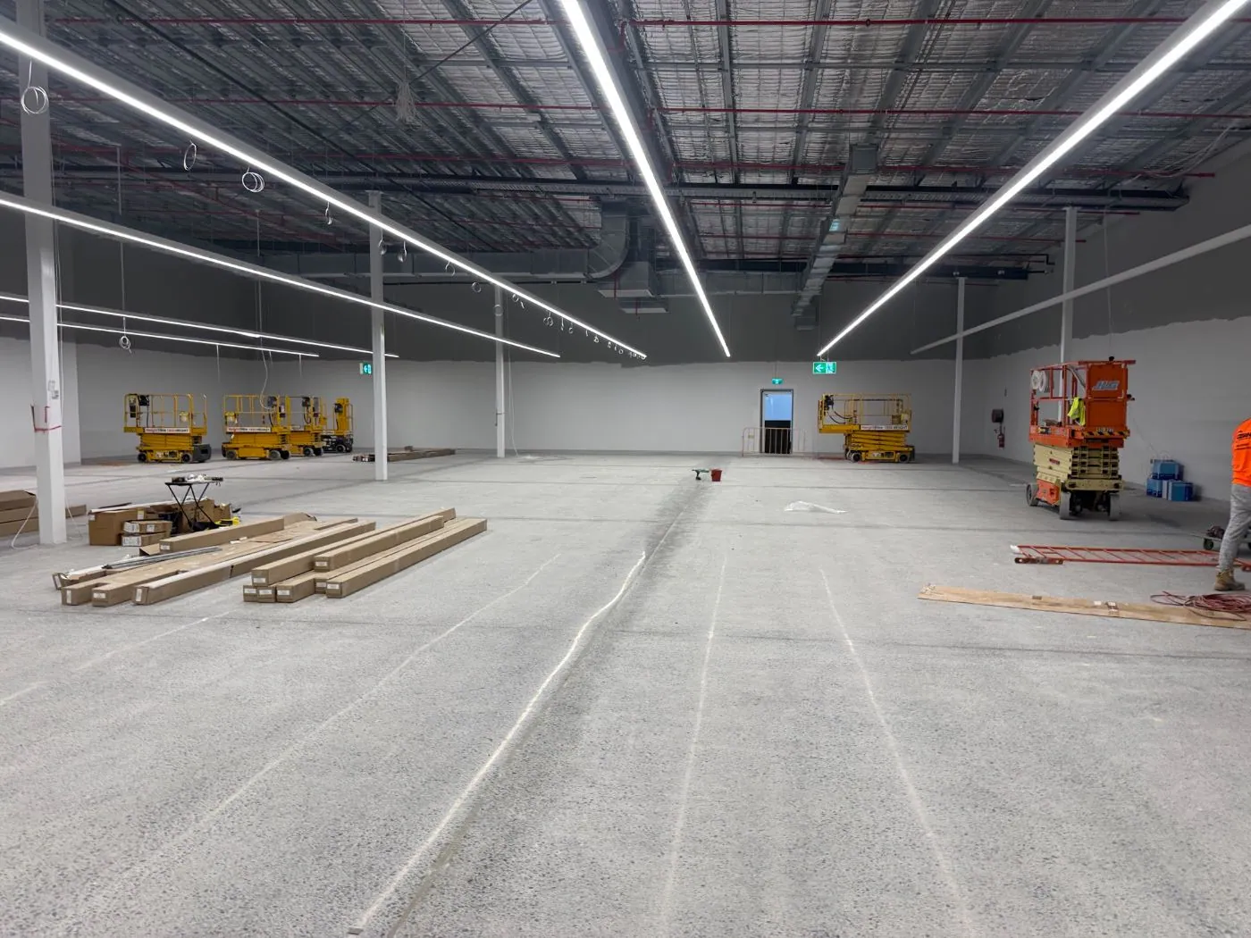Factory floor grinding and preparation in a large Australian warehouse fitout