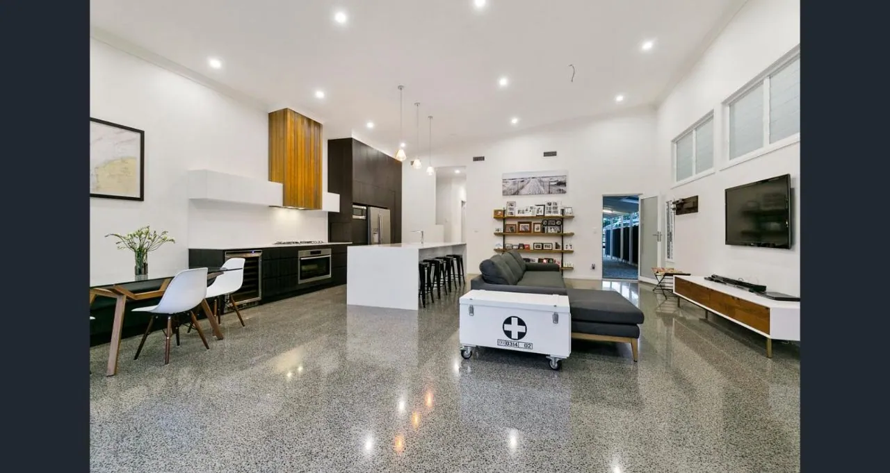 MPC high-gloss polished concrete across an open-plan kitchen and living room