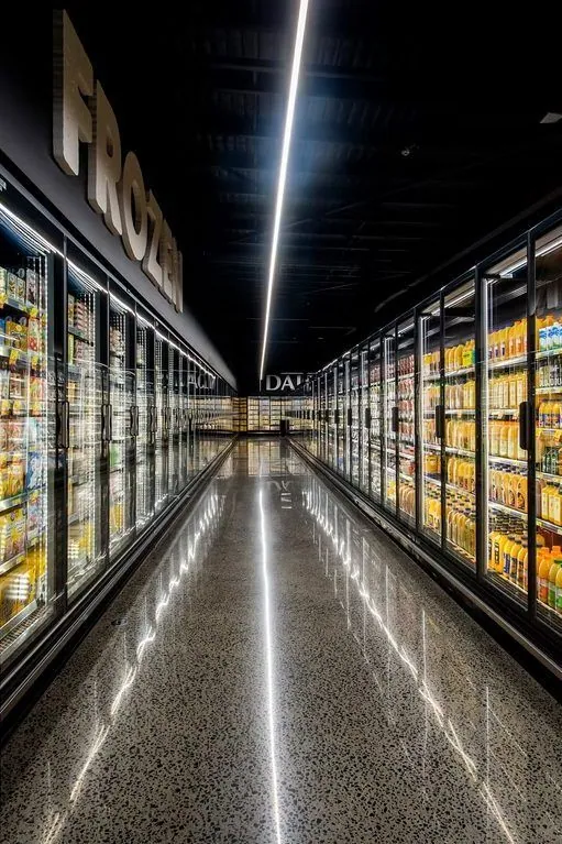 Full exposure polished concrete down a supermarket aisle