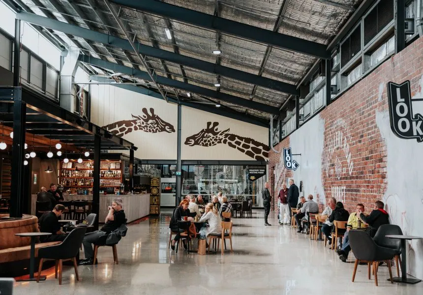 Polished concrete floor and giraffe mural in the Distillery Road Market hall at Zarraffas Coffee, Brisbane