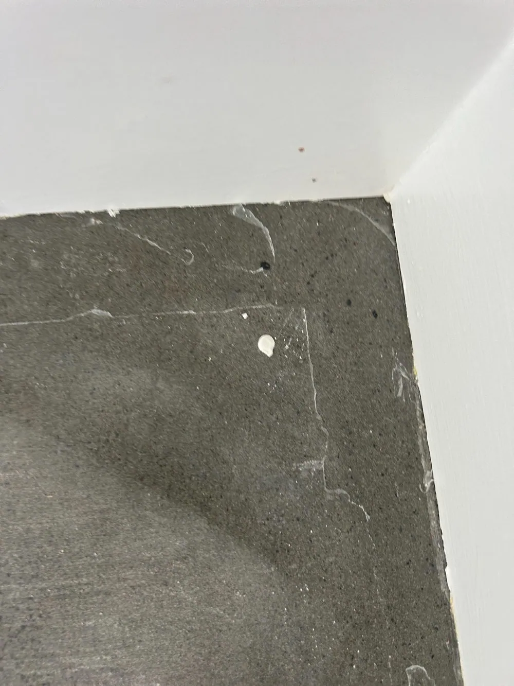 Tape lifting a coated floor