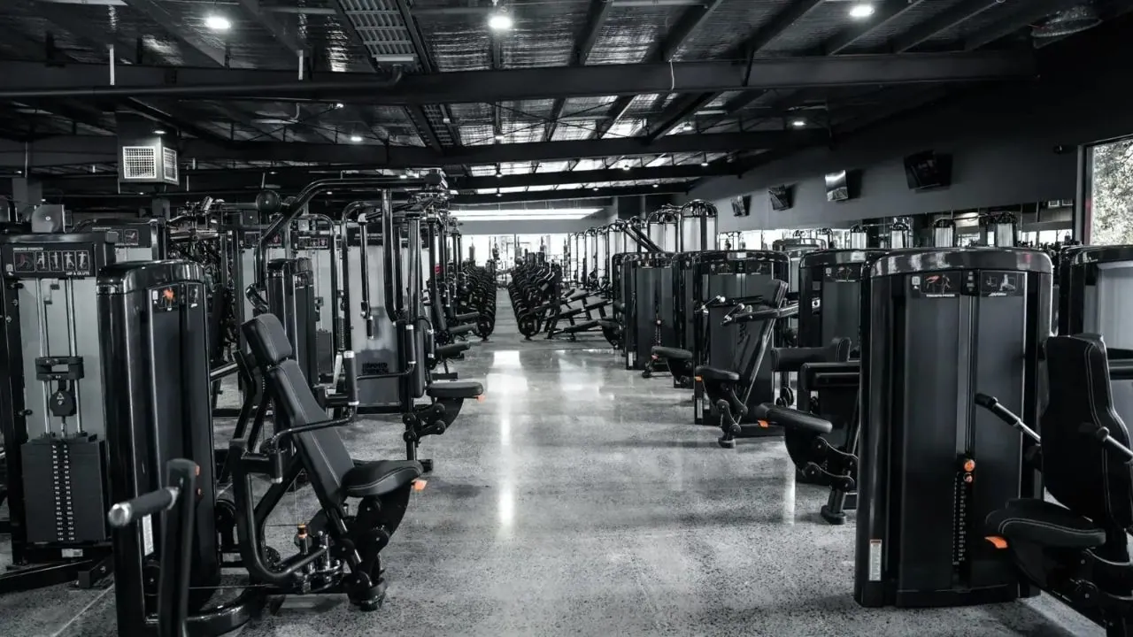 Minimal exposure polished concrete floor through a commercial gym