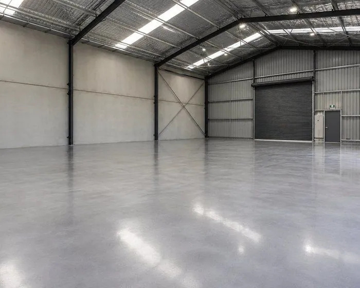 Grind and seal shed floor Polished and sealed concrete floor in a large industrial shed
