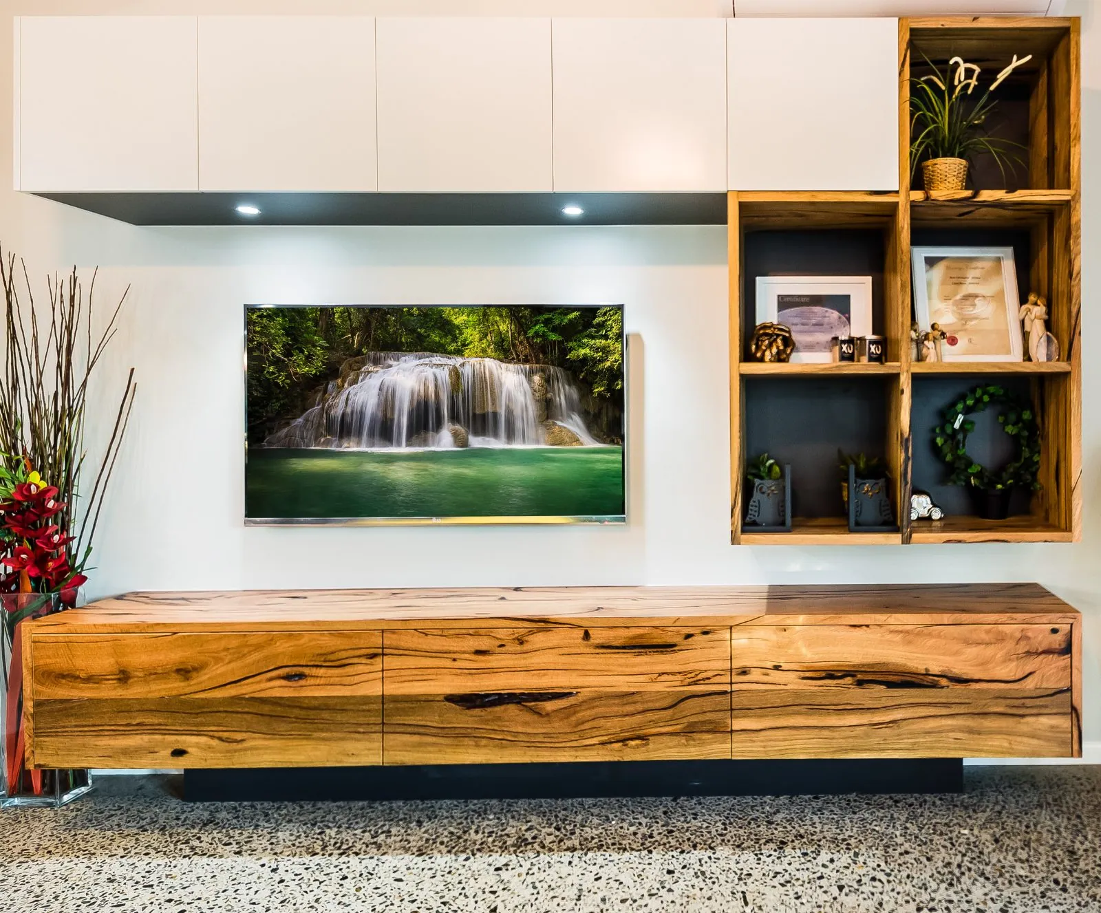 Polished concrete floor with timber cabinetry and TV wall, Alexandra Hills Brisbane