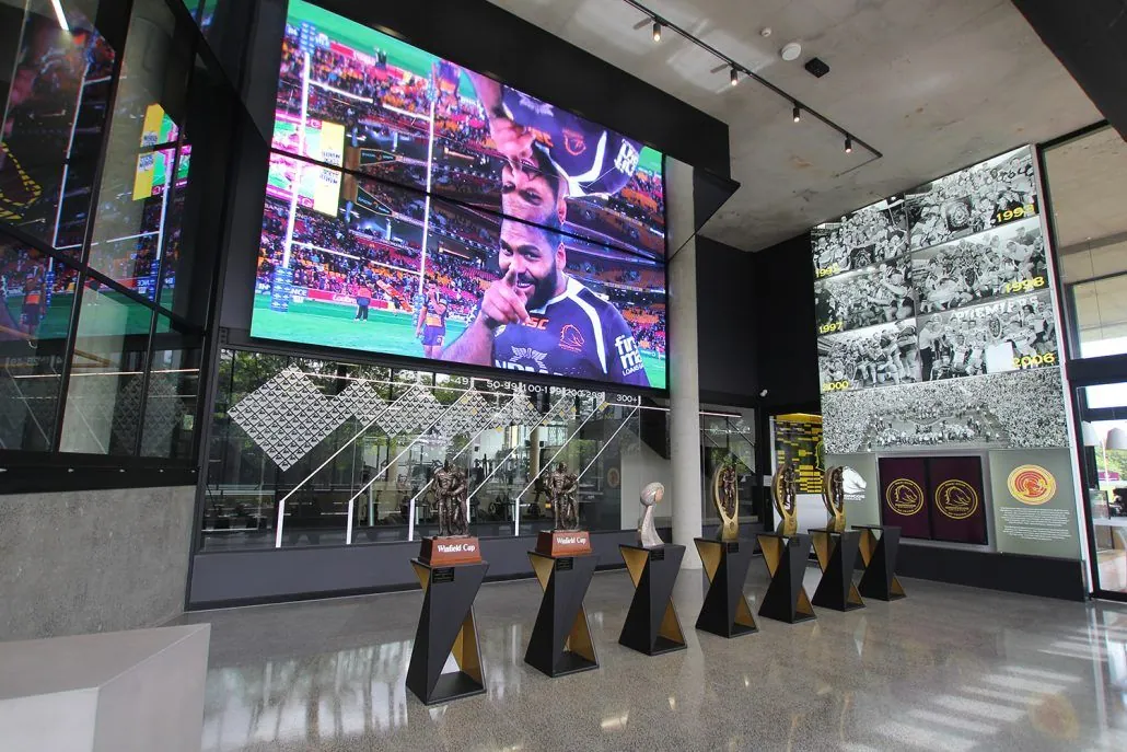 High gloss grind and seal concrete floor in the premiership trophy hall at the Brisbane Broncos Clive Berghofer Centre, Red Hill
