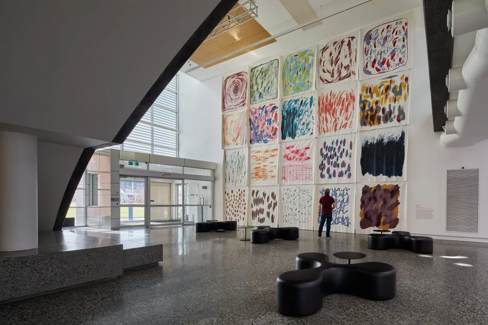 Colourful exhibition wall and mechanically polished concrete floor in the atrium at Murray Art Museum Albury