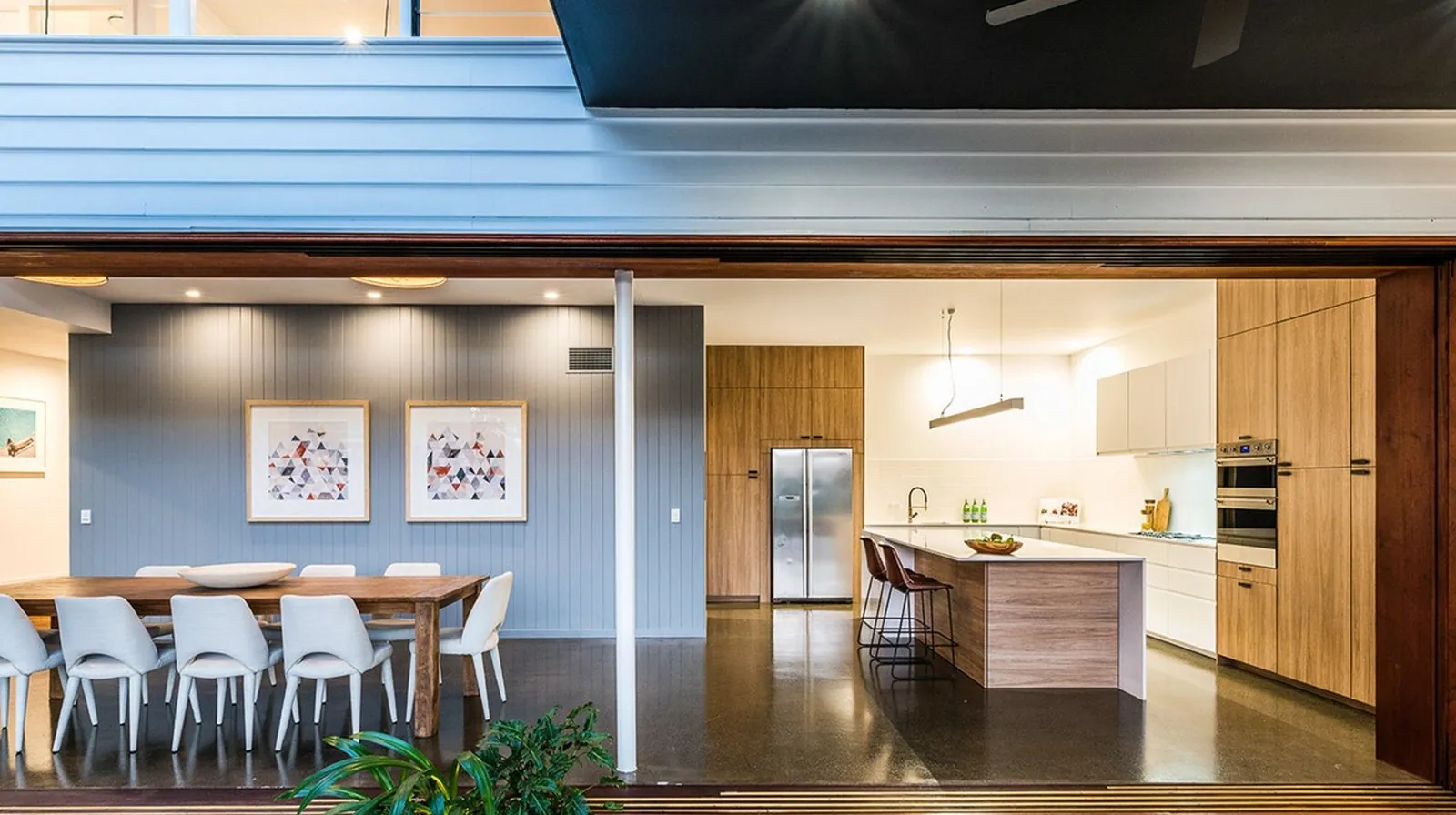 Grind and seal concrete floor in a Brisbane home opening to an outdoor deck