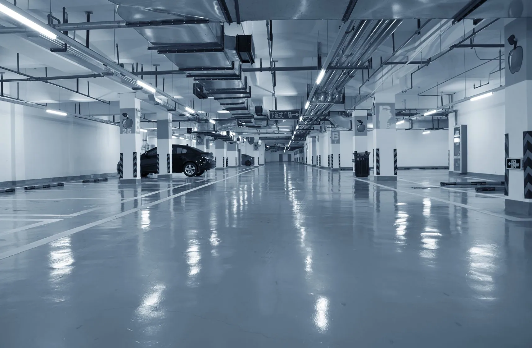 Glossy epoxy resin floor coating in a multi-level car park