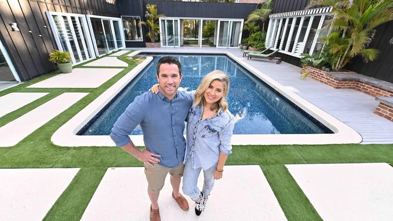 Michael and Carlene Duffy by the pool with honed concrete and outdoor polished concrete pool surrounds, as seen on Ready Set Reno