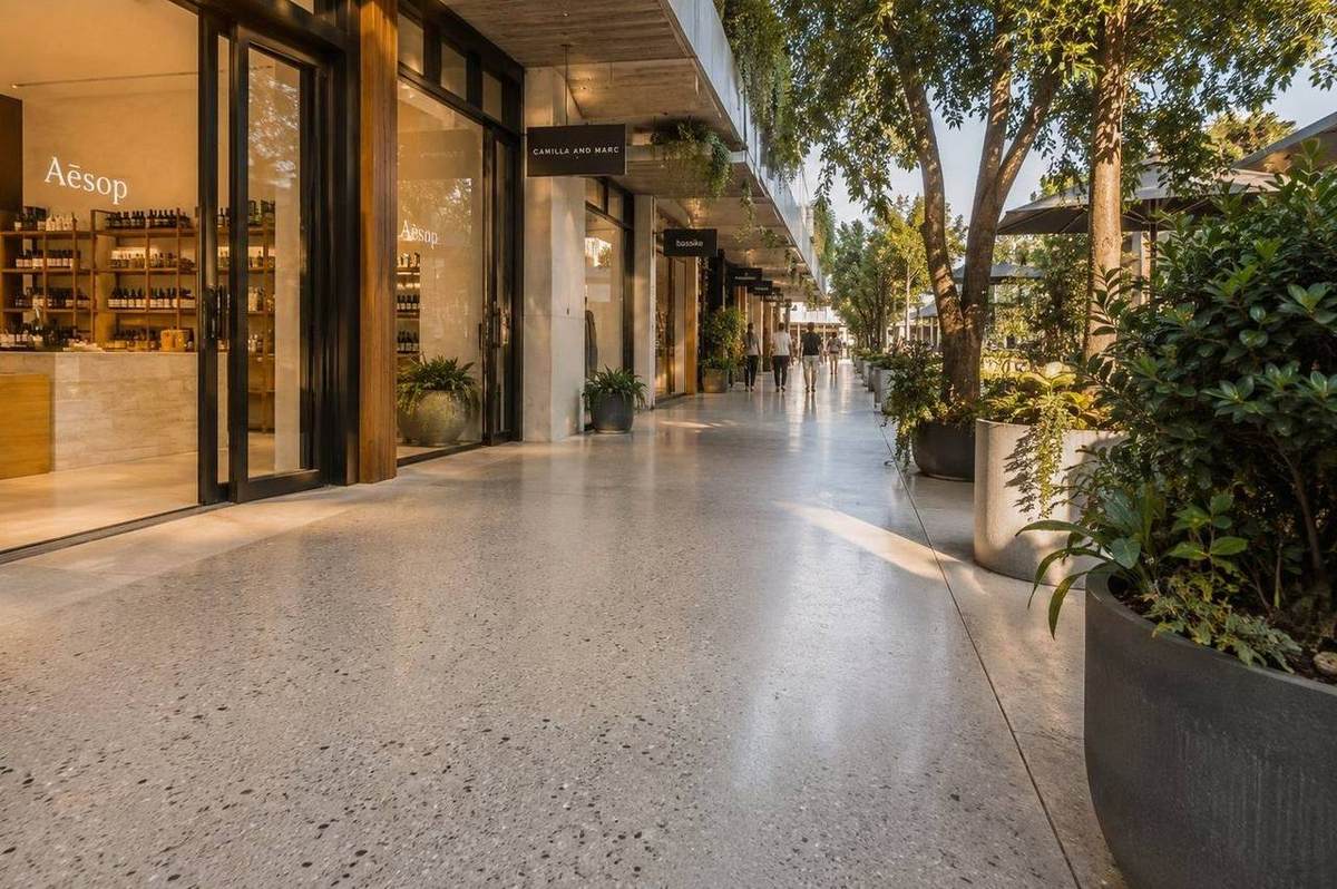Honed concrete patio beside a modern home, Gold Coast