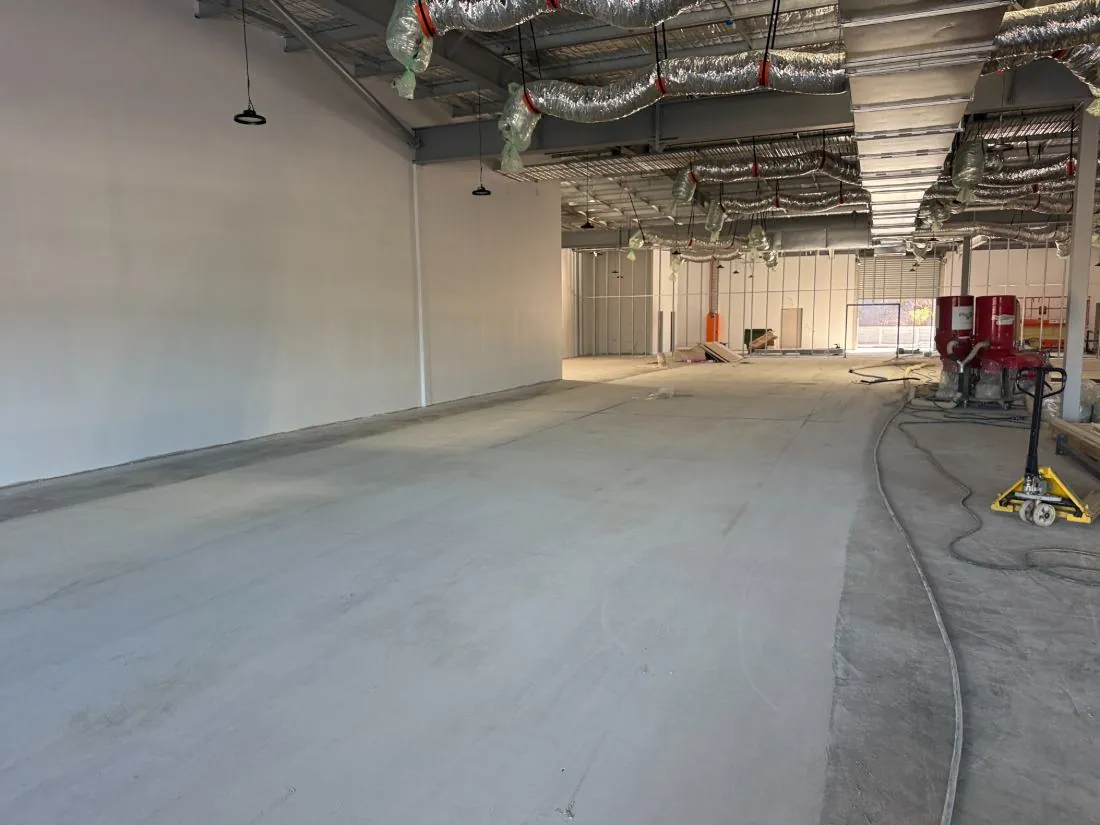 Surface preparation of a retail tenancy slab on the Gold Coast