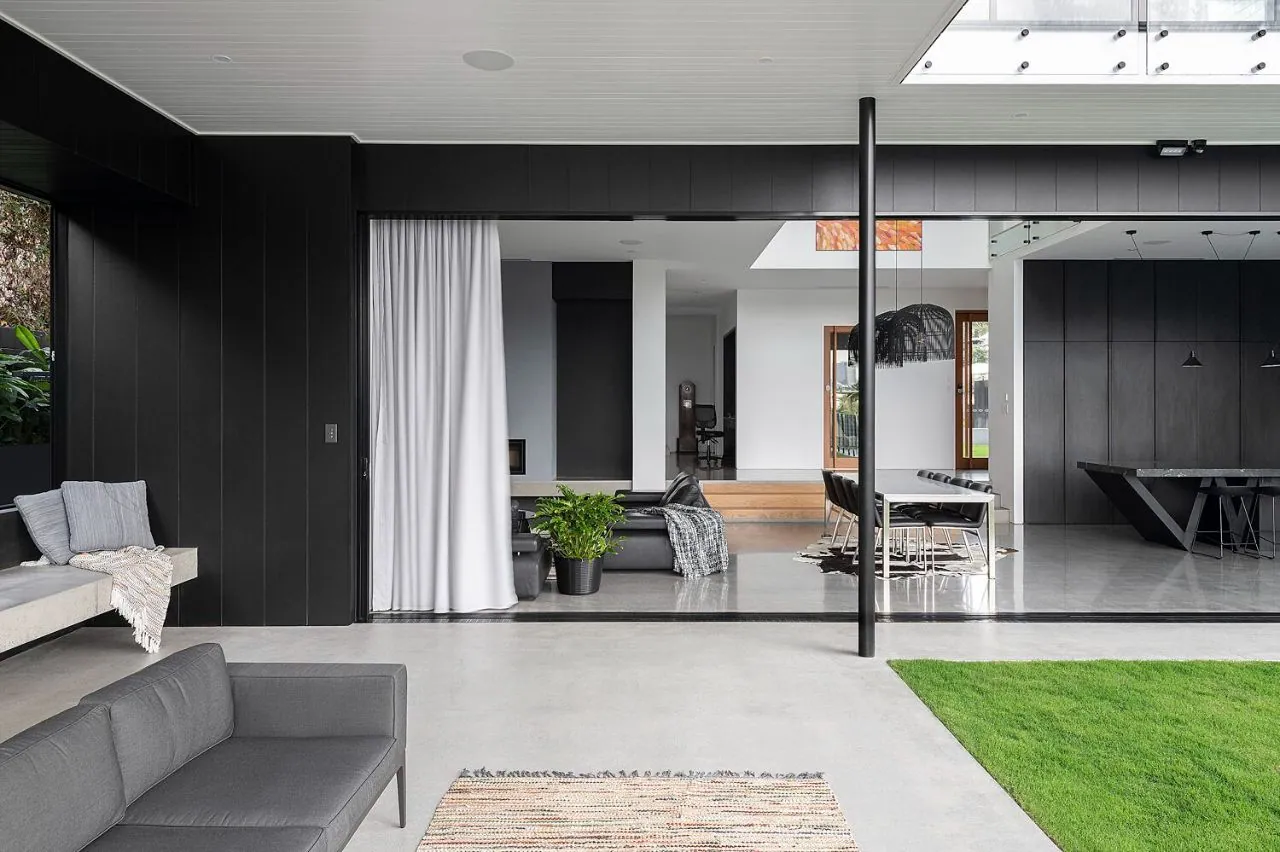 Nil exposure polished concrete flowing from indoors to a covered patio