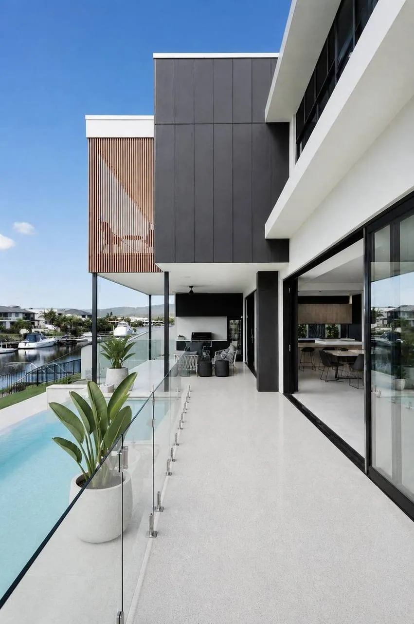 Honed concrete driveway with feature screens, Brisbane
