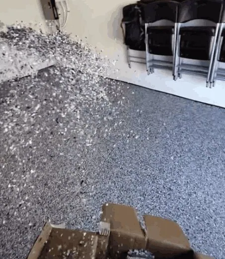 Broadcasting flakes onto wet epoxy, Brisbane