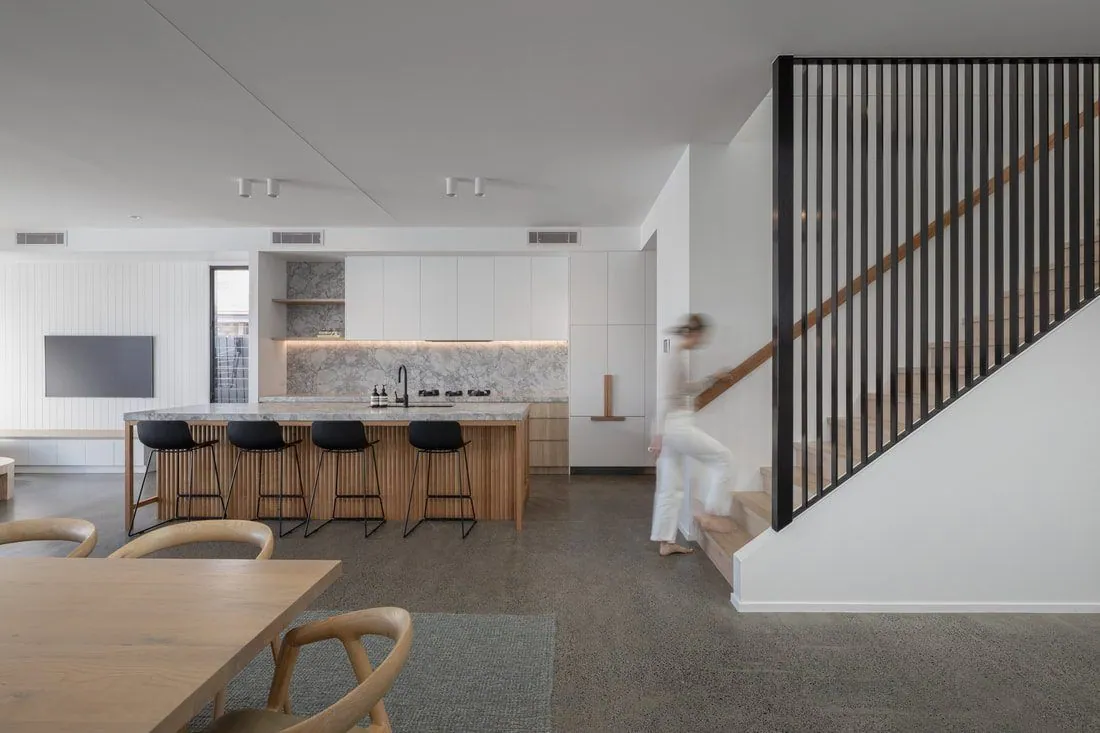 Full exposure polished concrete in a modern kitchen and dining area