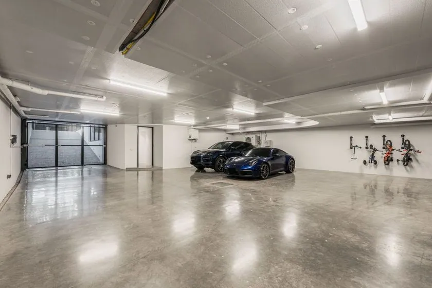 Polished concrete garage floor Brisbane Polished concrete garage floor with two Porsches in a Brisbane home