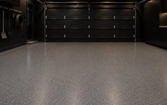 Black flake epoxy garage floor Brisbane Black flake epoxy garage floor in a modern dark Brisbane garage