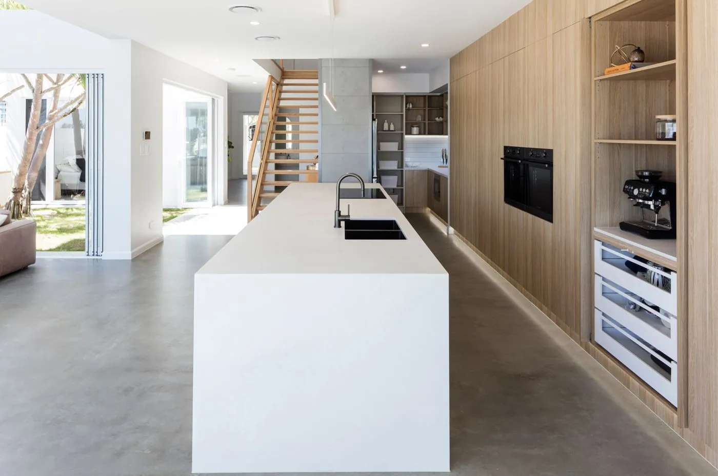 Polished concrete floor in the butlers pantry of a Monster Homes residence, Brisbane
