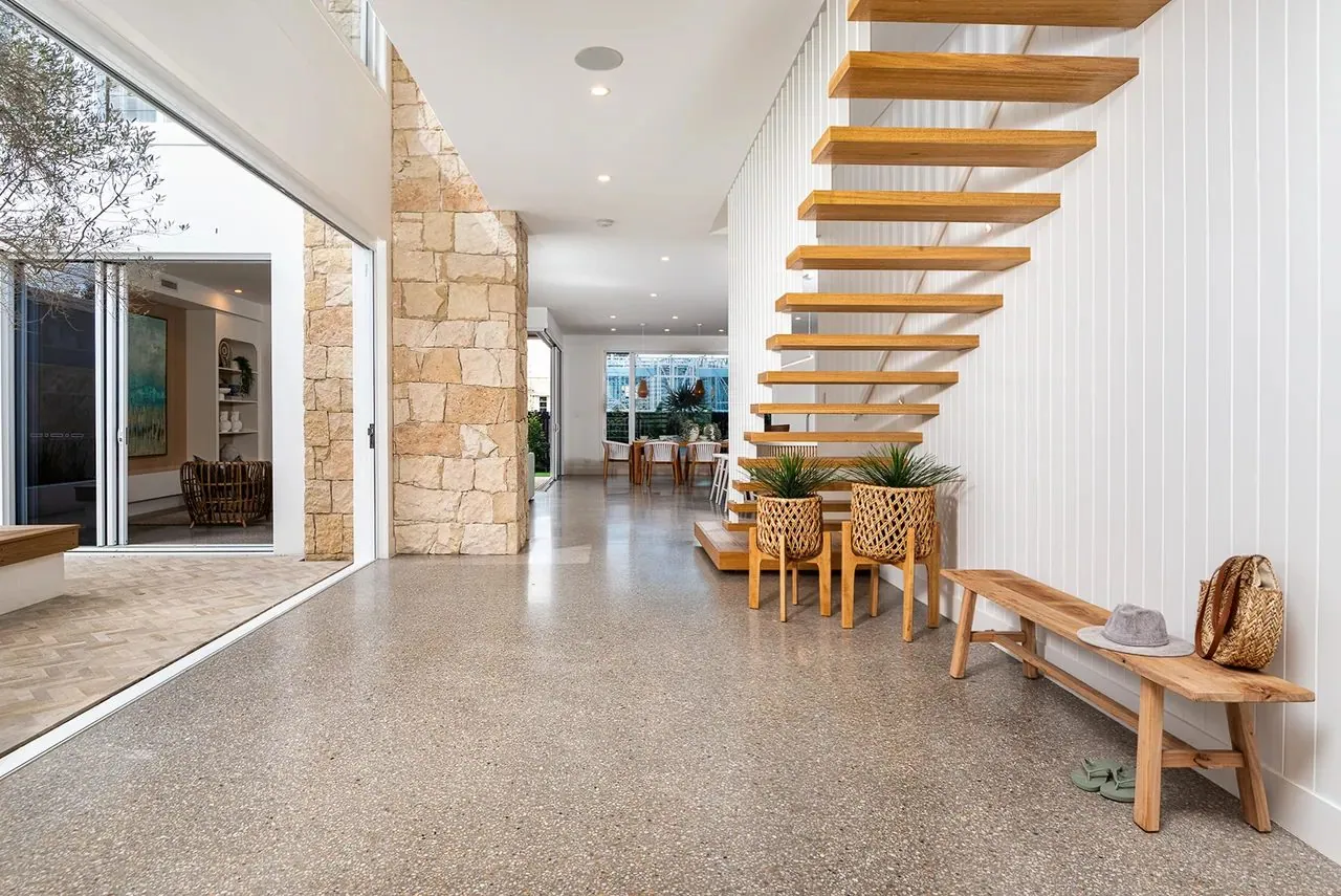 Polished concrete entry floor in a display home Brisbane