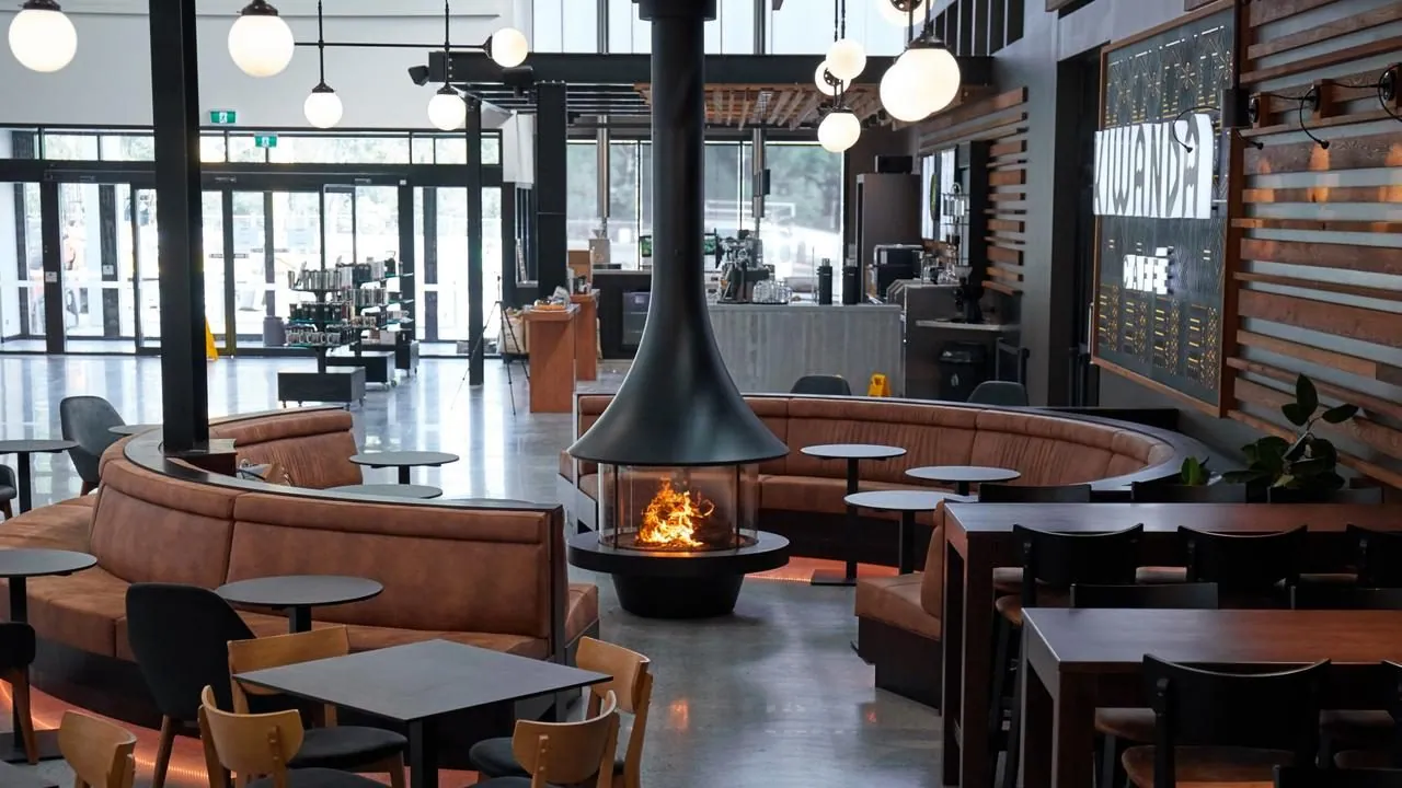 Polished concrete floor in the Distillery Road Market cafe with a suspended fireplace, Zarraffas Coffee Brisbane