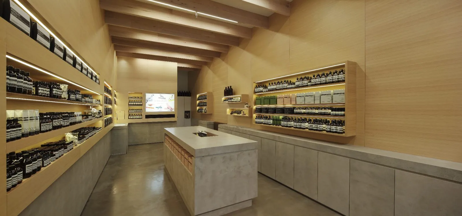 Grey polished concrete overlay floor in the Aesop Carindale store, Brisbane by OzGrind