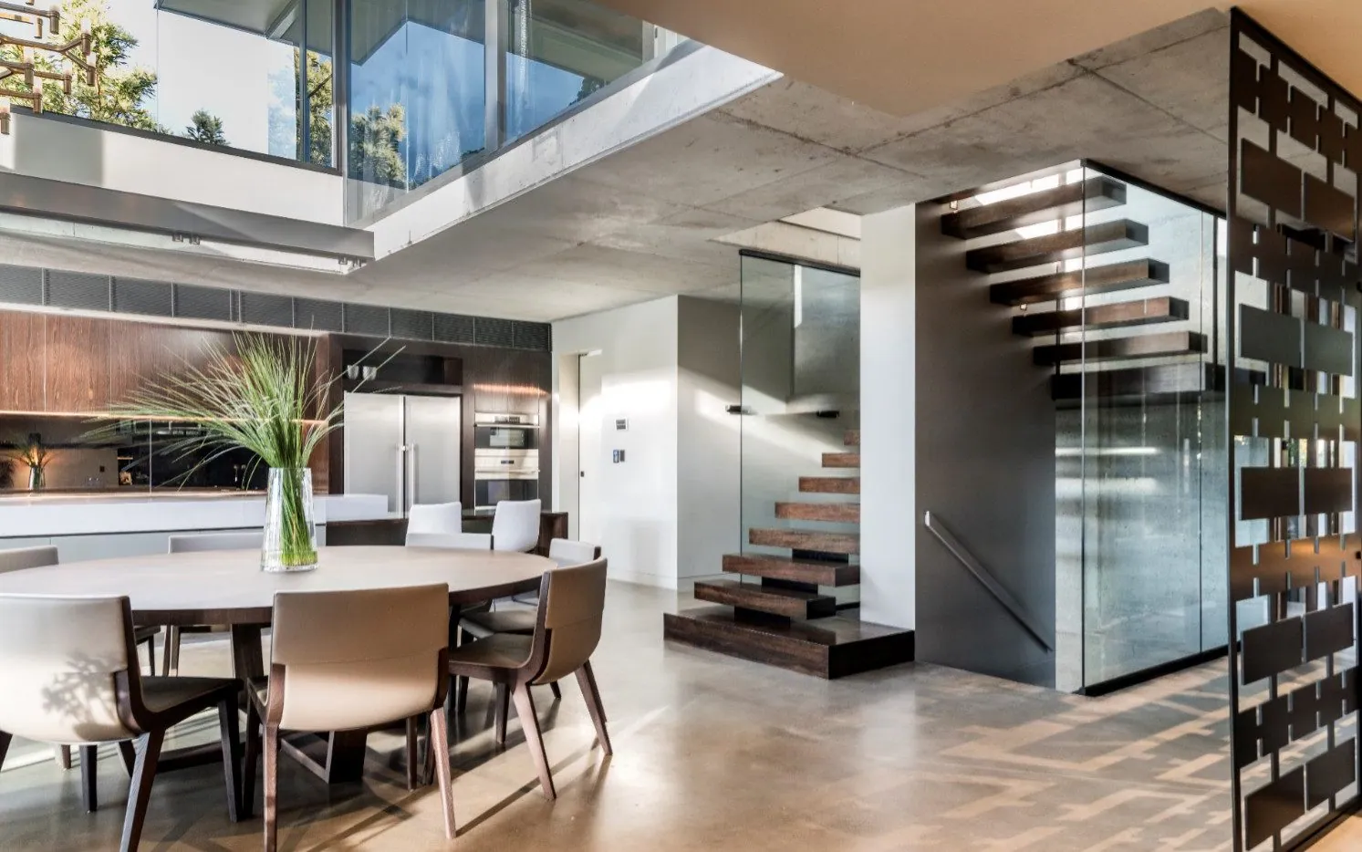 Nil exposure matte polished concrete floor in an architecturally designed home on Molonga Terrace, Graceville Brisbane (7)