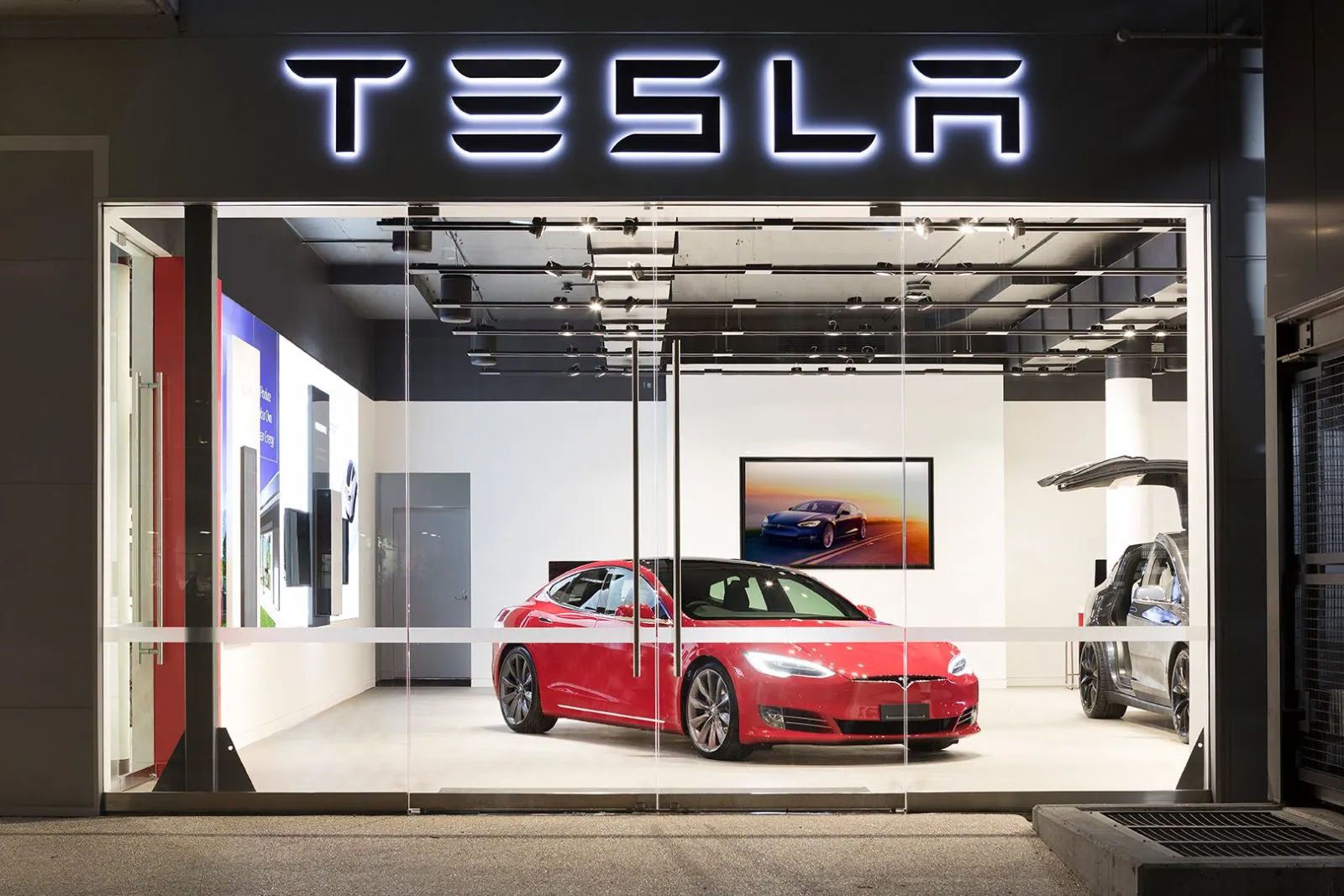 Tesla showroom storefront with a Model S on an OzGrind epoxy coated floor, Fortitude Valley Brisbane