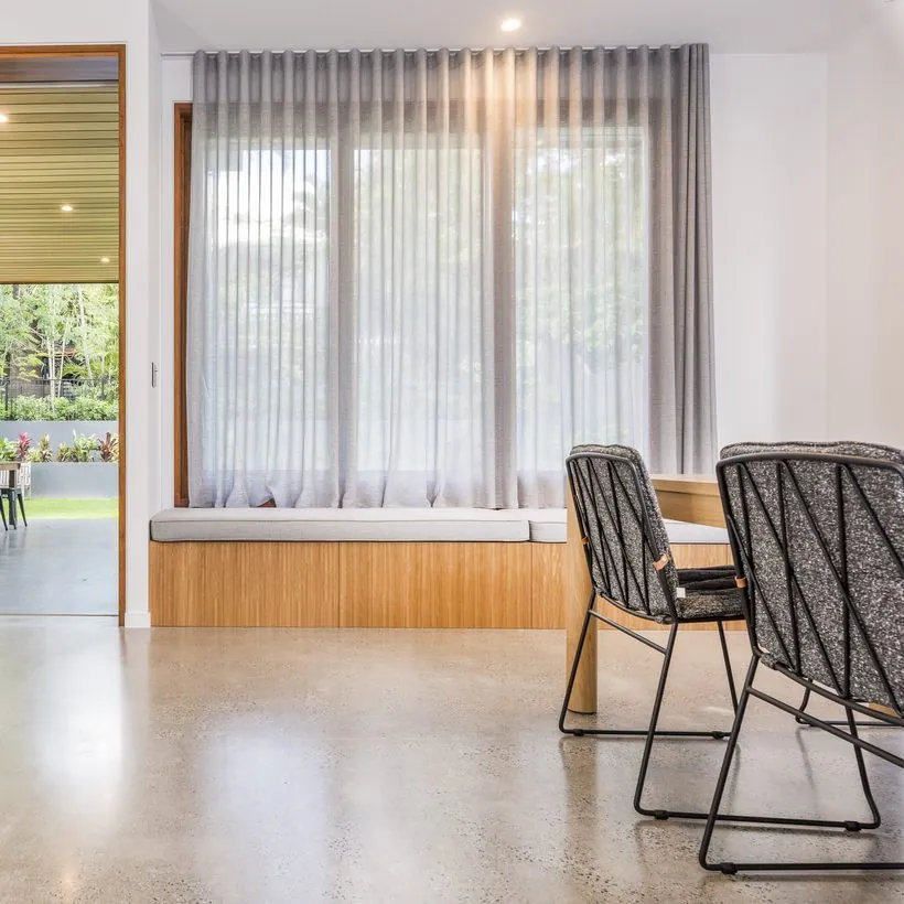 Mechanically polished concrete floor with matte minimal-exposure finish, Auchenflower Brisbane home