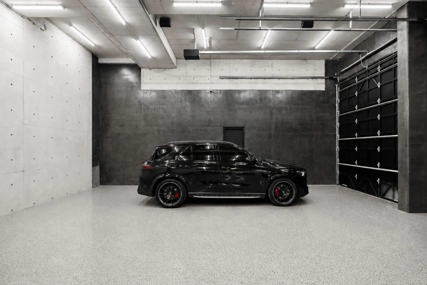 Epoxy flake garage floor by OzGrind, Brisbane