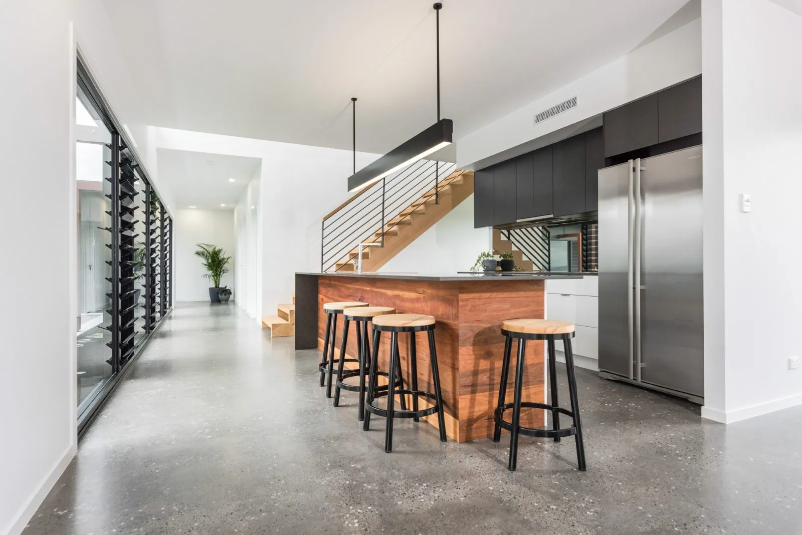Minimal exposure matte polished concrete floor at the A and K designer build, Cedar Creek Brisbane (2)