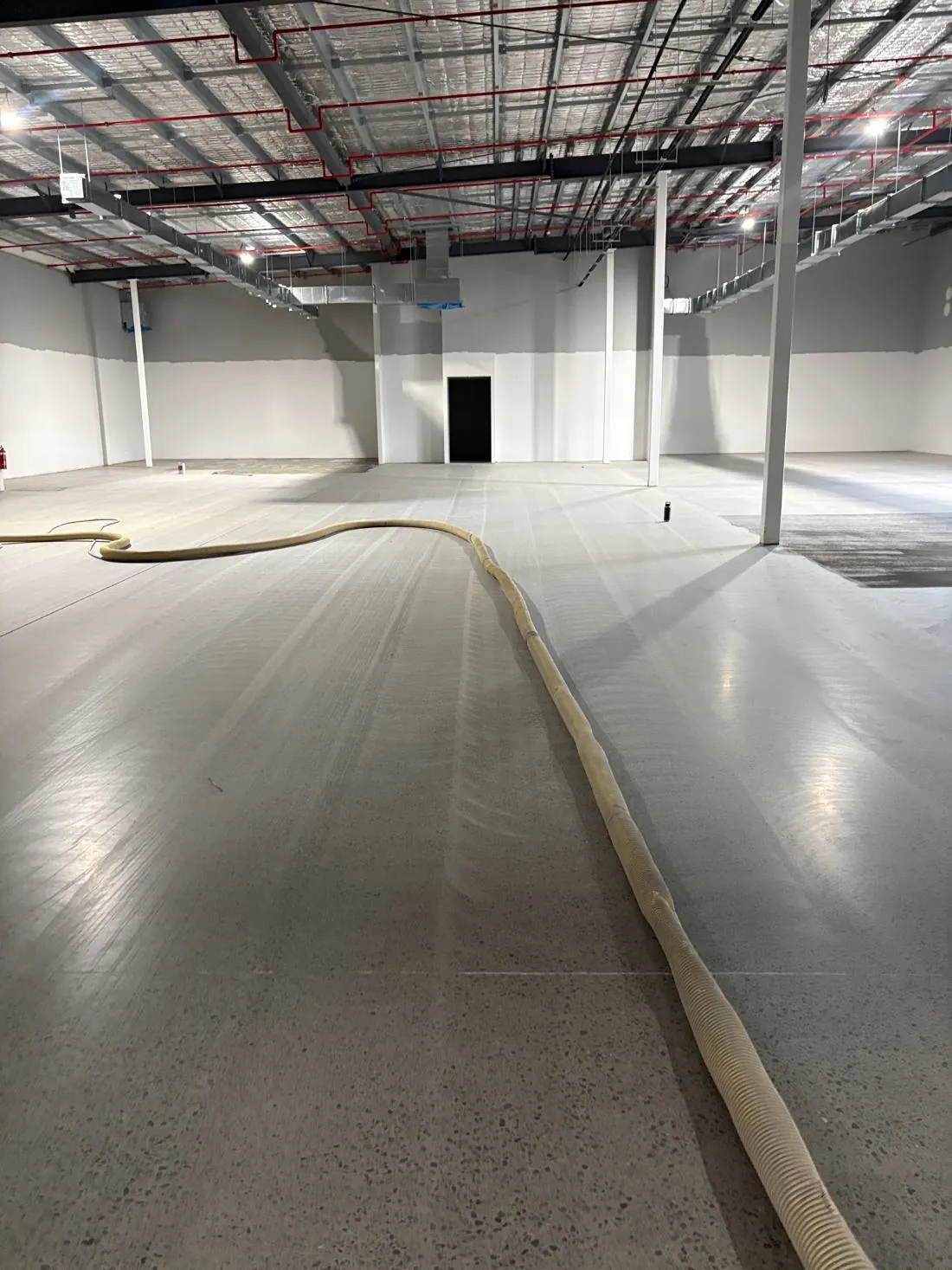 Densified concrete floor after grinding and surface preparation