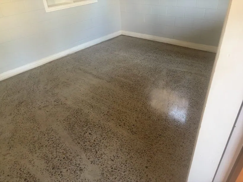 Honed concrete floor with light stone exposure