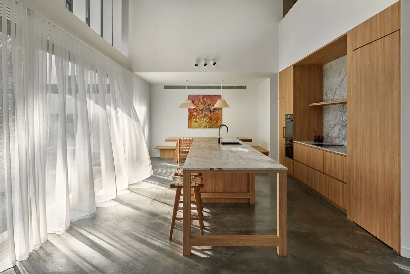 Polished concrete floor in a Brisbane workplace breakout space