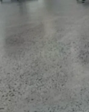 Minimal random stone exposure polished concrete