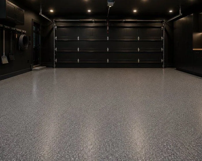 Grind and seal garage floor Grey grind and seal garage floor in a modern dark garage