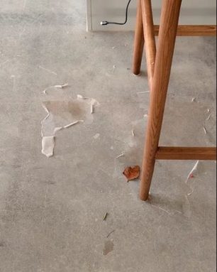 Peeled & Flaked Sealer on a grind and seal concrete floor