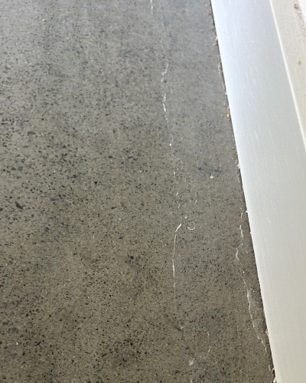 Perimeter Delamination on a grind and seal concrete floor