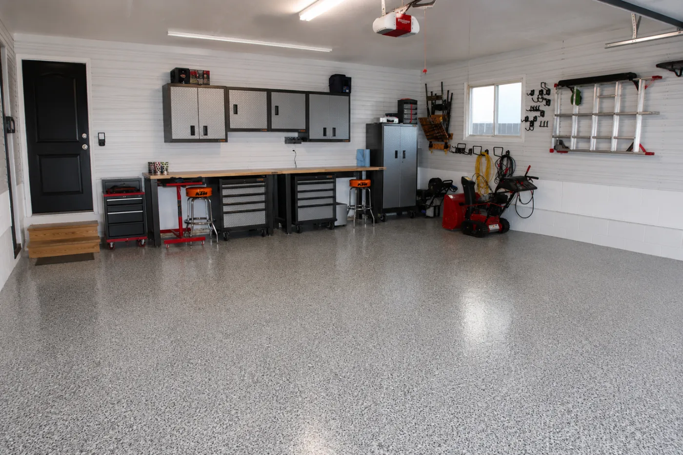 Epoxy flake garage floor coating in a Brisbane home workshop garage