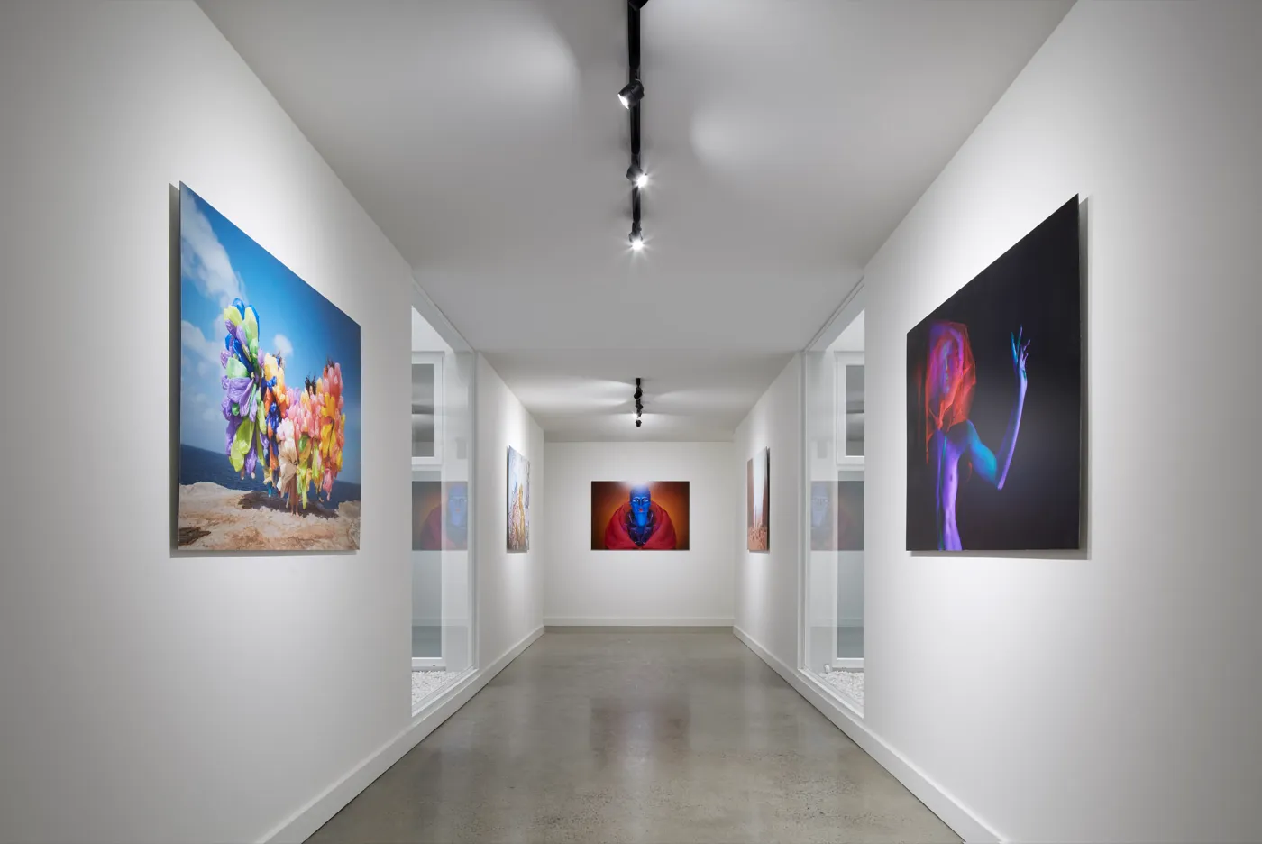 Grind and seal concrete floor with minimum stone exposure and a matte finish in a Brisbane art gallery