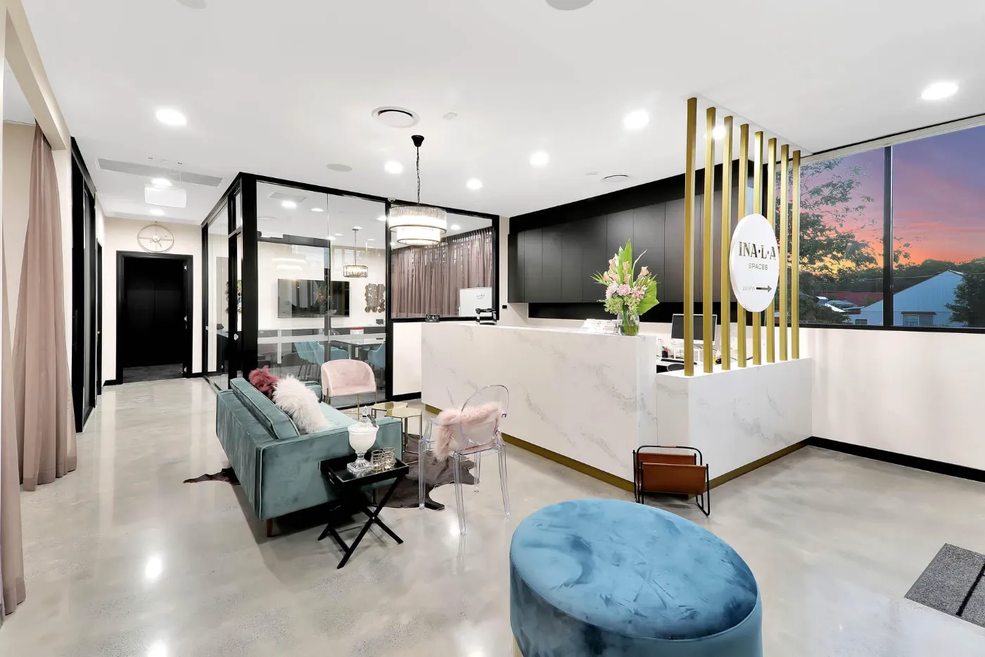 Mechanically polished concrete floor with a nil stone exposure high gloss finish in the Inala Spaces office Brisbane