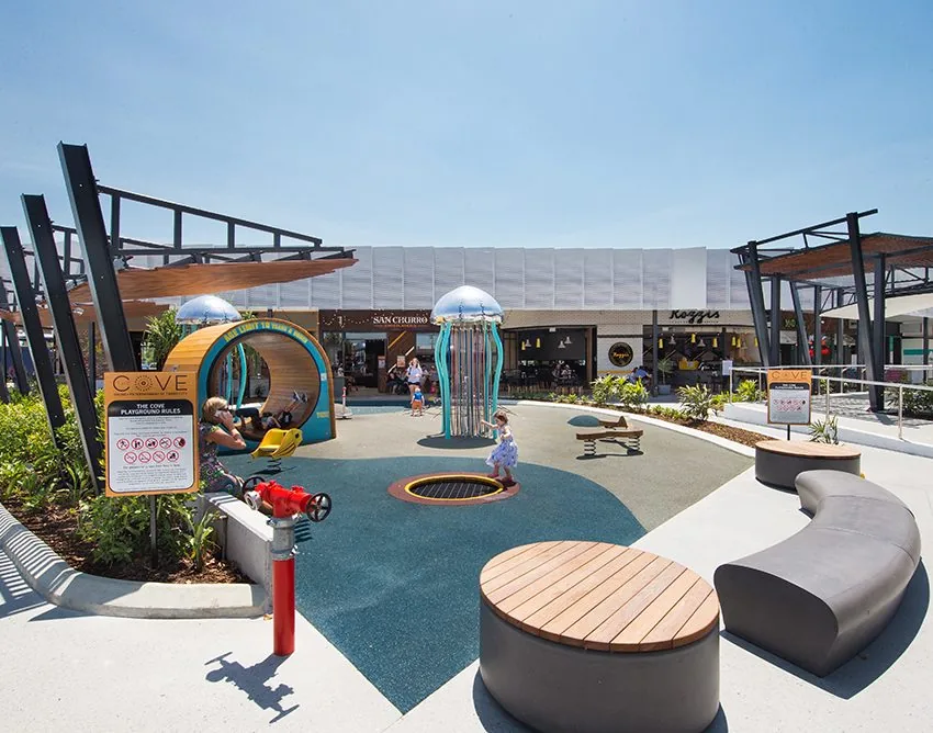 Shopping centre flooring: honed concrete through The Cove playground at Tweed City, Tweed Heads