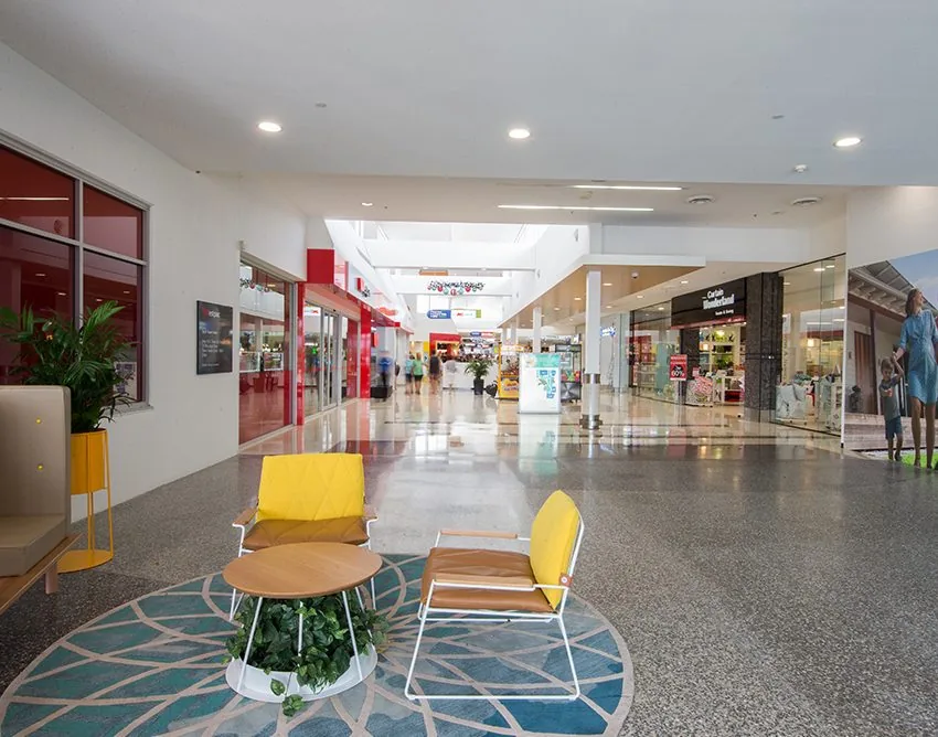 Polished concrete Tweed Heads: honed concrete mall flooring inside Tweed City Shopping Centre